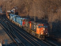 CN 392 slides off the Dundas Sub through Bayview with CEFX GP20D's for RaiLink and CEFX AC4400CW's for the Arnaud Railway.