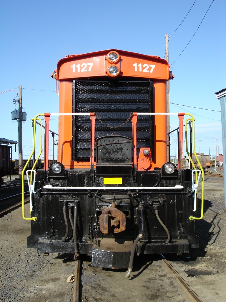 This nose shot of DESX 1127 (ex-CN GMD-1) clearly shows the fresh paint was applied over an unprepared/unsanded body.  Note the backlit number boards have been patched over and decals have been applied to display the running number.