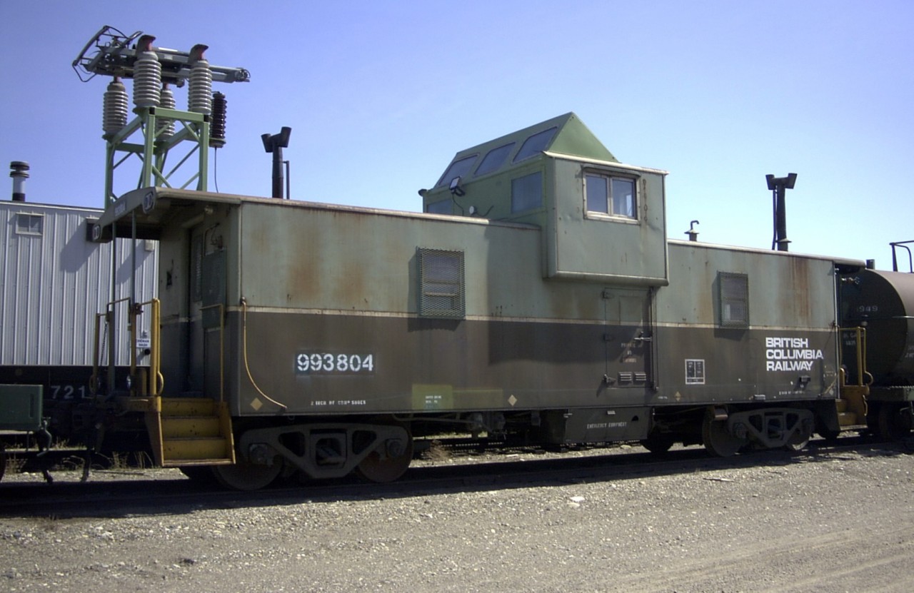 Look!  Up in the sky!  It's bird!  It's a plane!  Nope, it's just more wires!  BCR 993804 was a catenary inspection van used on the Tumbler Ridge line back in its day.