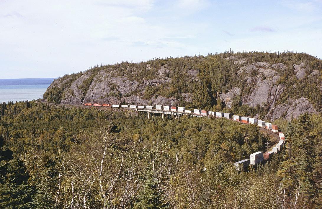 CP 5075, with west bound 493 crossing the Little Pic River, at Neys, Ontario.   9/19/1997