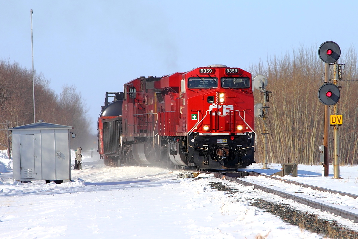 An eastbound manifest pulls out of the siding at Bagot.