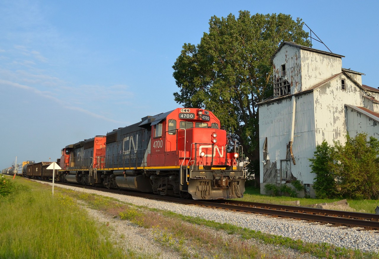 CN 438 passes by the old abandoned grain elevator at Prarie Siding on its daily trip to London.