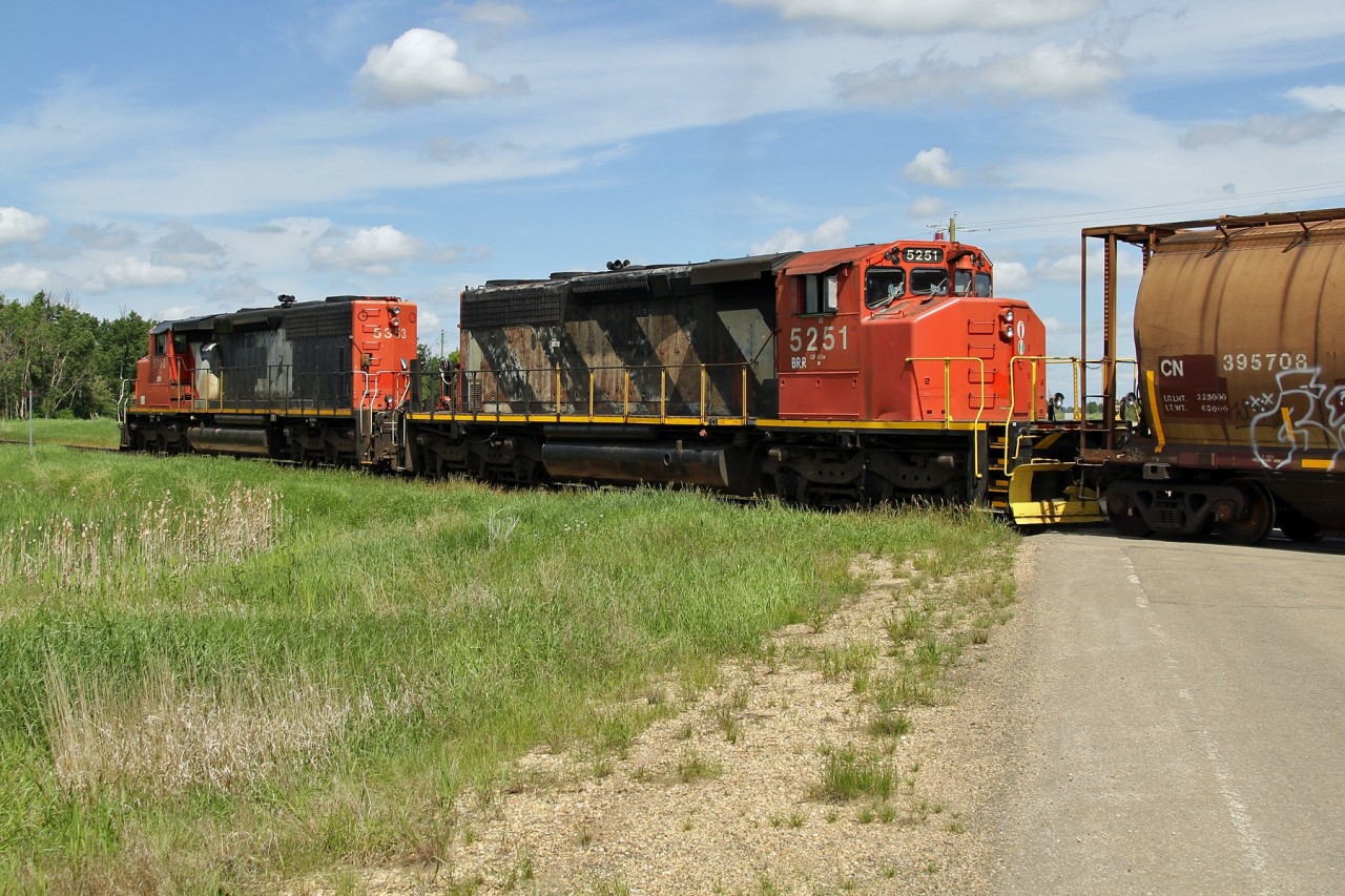 Battle River Railway's ex-CN SD40-2(W)s 5353 and 5251 head towards Camrose as the travel west on the former CN Rail Alliance subdivision.