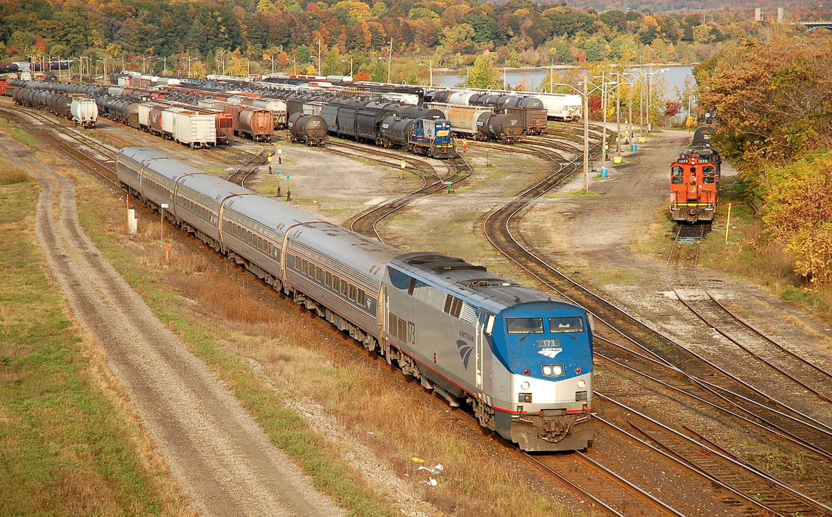 VIA #97 making it's way past SOR's Stuart Street yard with AMTK 173 leading the way