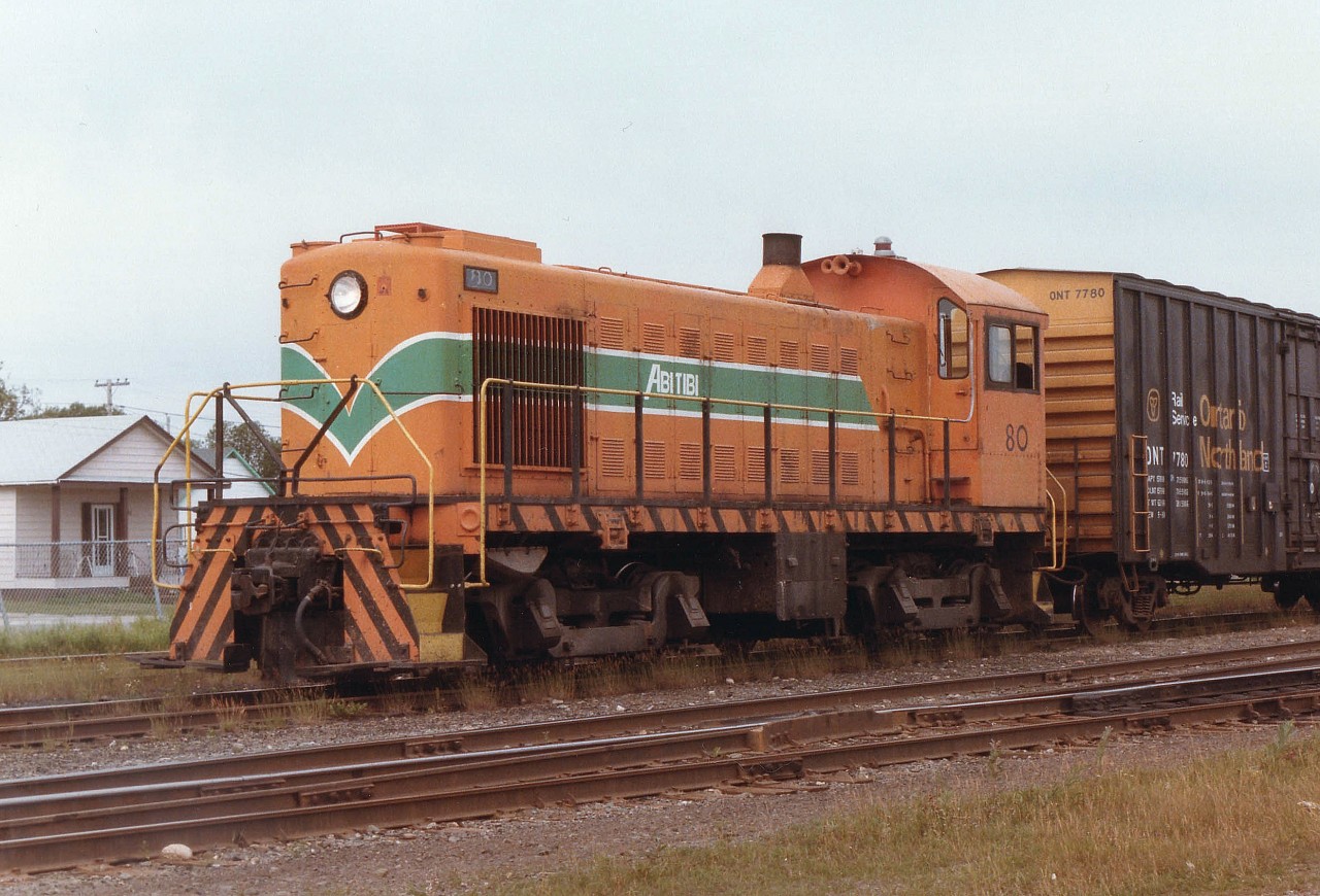 The sole reason for Iroquois Falls, the town as well as the subdivision, is the huge pulp & paper plant located there. Abitibi #80, an MLW S-4 acquired new in 1950, is seen working just outside the plant property. I don't believe this unit is on the property any more, and have no idea where it has gone.