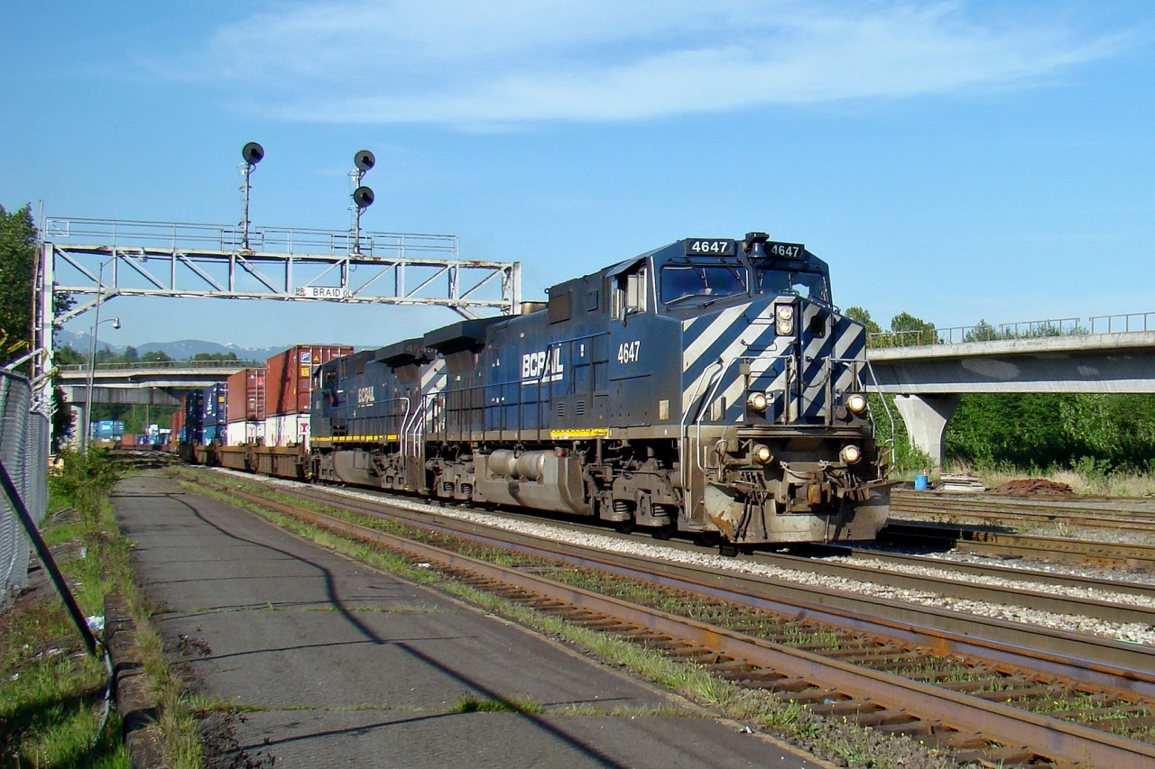 Dash 9-44CWs 4647 and 4645 pass the former Great Northern depot in New Westminster as they lead a transfer off of CP Rail's Westminster Sub.