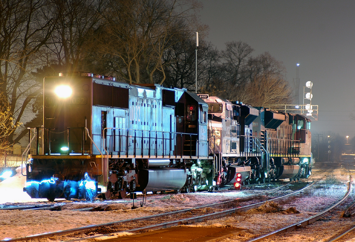 X396 with CN 8861 - CN 8102 - IC 1032 for power after making it's setout, soon they will shove back into the yard and make a lift.