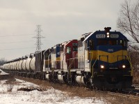 DME 6055 - CP 6009 - ICE 6211 lead 81 cars as they take the siding at Orrs Lake to meet CP 235