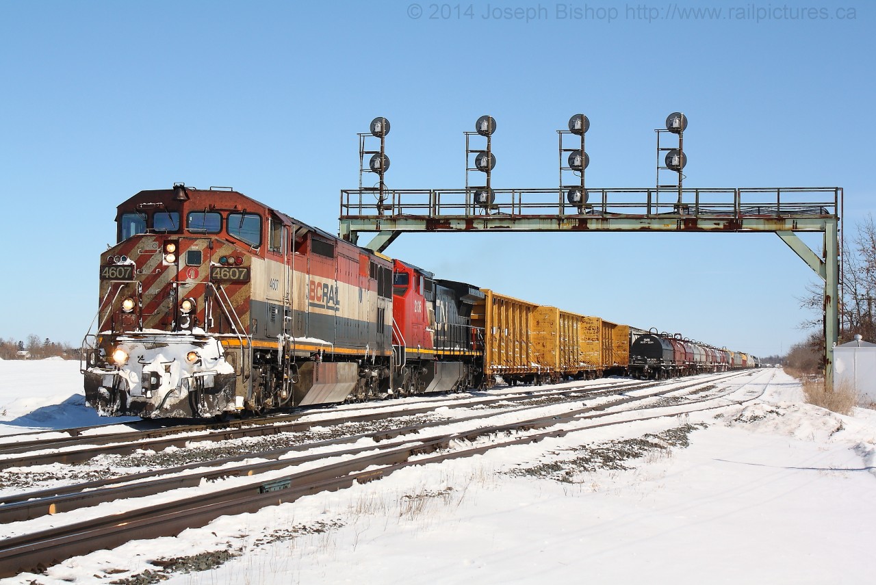 CN 331 pulls under the signals at Paris West with BCOL 4607 on the point.  The day before a snow storm dropped up to 20cm of snow in some places making for a wintery scene in the middle of March.