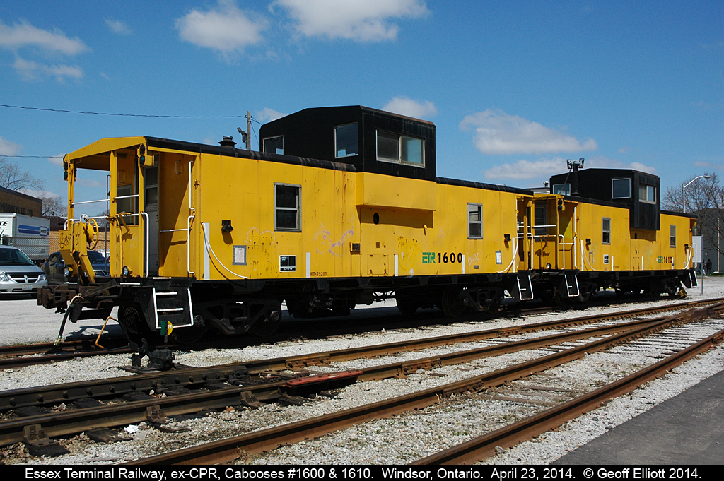 Essex Terminal Railway, ex-CPR Angus Shop built cabooses, #1600 and 1610 bask in the mid-day sun as they spend there last few hours lettered for the ETR.  These cabooses will be relettered WCRX 1040 and 1042 for their movement off the property and to their new owner Waterloo Central Railway.