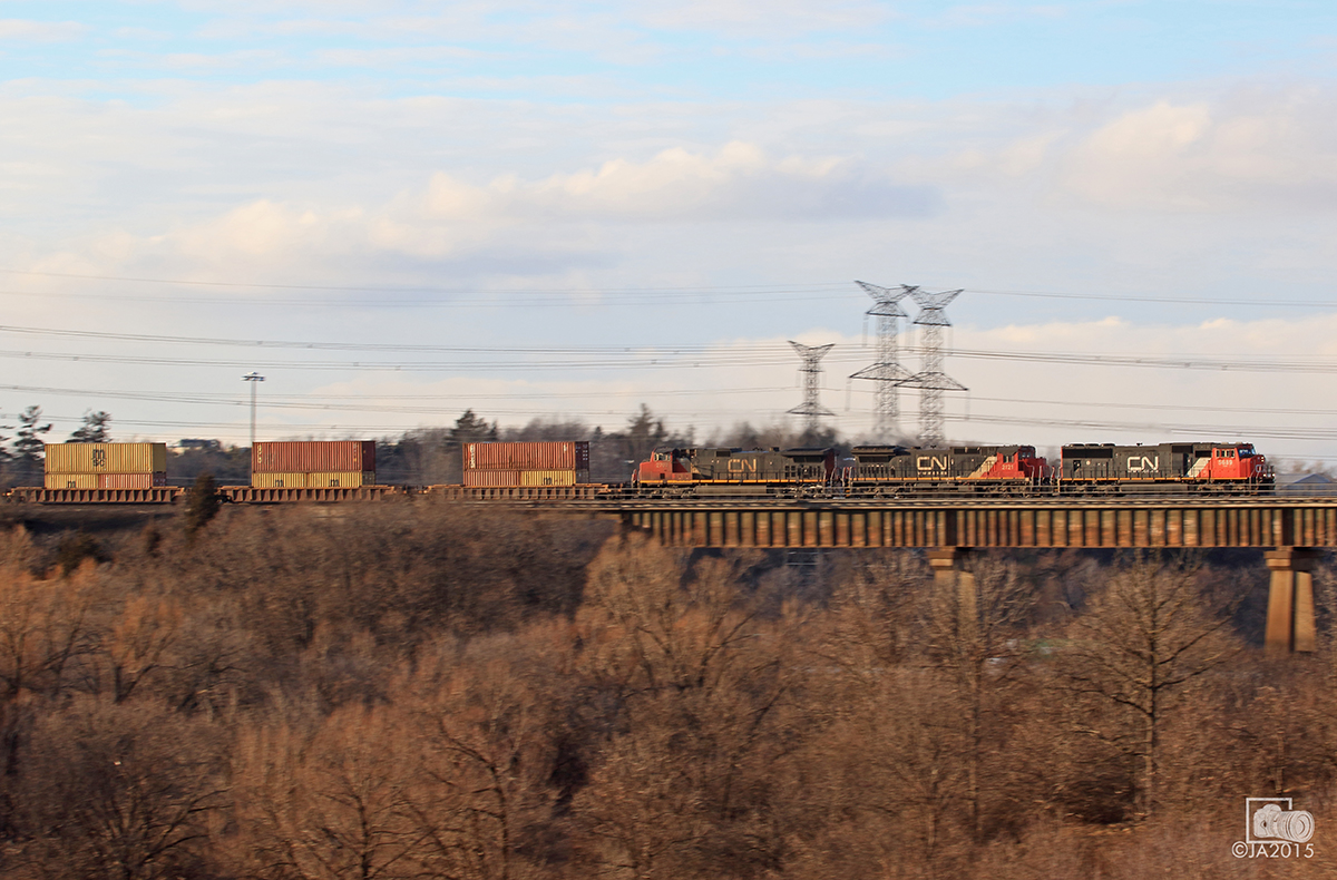 Panning CN 5689, CN 2121, CN 2707 as it leads CN Q148 east on the Halton Sub across the humber trestle.