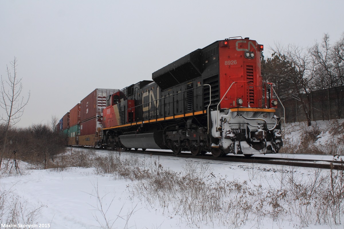 Robert's Bank, BC - Toronto BIT, ON train Q10251 makes an appearance on the York Subdivision with as seen here a SD70M-2 locomotive shoving on the tail end bringing this beast up the grade at Snider.