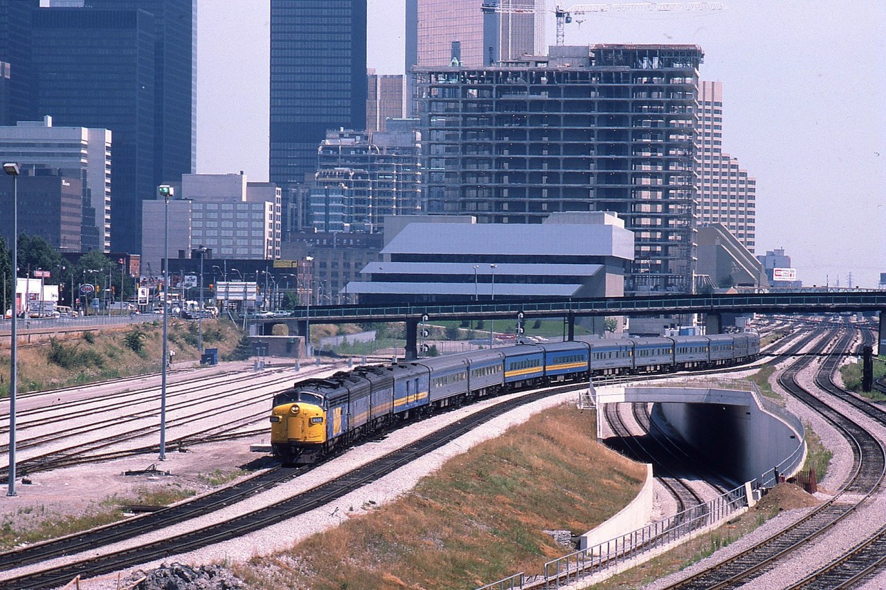 Northbound Canadian leaving Union approximately 1230; power VIA 6506, 6621 and 6636. Looking at this scene from almost 30 years ago with all the construction buzz, it is hard to believe that even today buildings are going up by the score. There always seems to be room for still another condo tower in the ever-changing skyline.