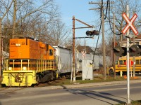 496 with QGRY 2301 and 4 cars crossing Mohawk Street on it's way to Ingenia