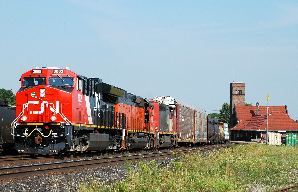 A43531 16 arriving at Brantford with brand new CN ET44AC 3002, BLE 910 and CN 2433