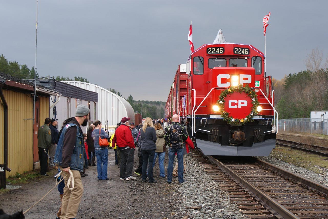 CP 2246 is seen stopped in Midhurst (Mile 67) with the 2014 CP Holiday Train. The turn out that year was incredible. They had anticipated a crowd, but was caught off guard (as was I) by the mass of people that awaited them as they arrived. The crew seemed slightly concerned and where kept very busy as people swarmed the train at all angles soon after arrival. After a short, and very successful stop, the train continued its journey north making several stops before reaching its final destination of that day in Sudbury.