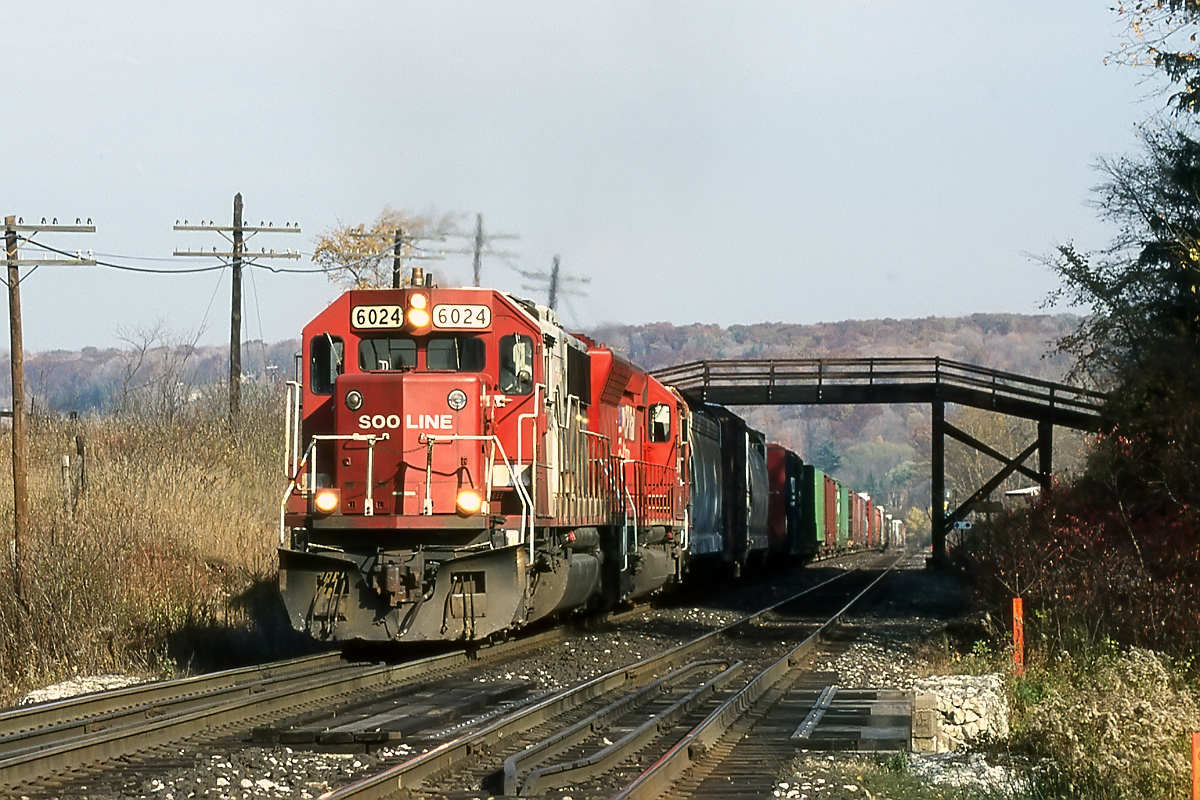 With an SD45 rebuild trailing, ok an SD40-3, the climb up the Niagara Escarpment continues.