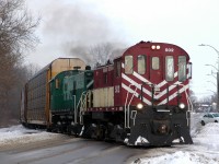 Ontario Southland S-13's 502 and 501 hustle a string of autoracks to Cami from interchange with CN in Beachville