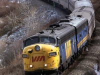 About 20 minutes after the eastbound "Canadian" passed, its westbound counterpart arrived at the east switch at Brickburn. The lead unit was sporting the red "VIA", a relative rare site. Don't you love the jerry-rigged ditch light setup.