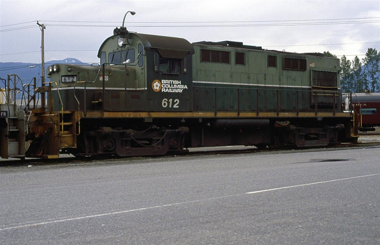 I don't know if I ever visited North Vancouver on a sunny day... but I was there before everything went to that awful blue, white and red paint scheme. This RS-18 had a chopped nose, but still had its Alco engine.