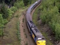 In the heart of the Fraser River valley, the westbound "Super Continental" is at Alexandra Bridge.