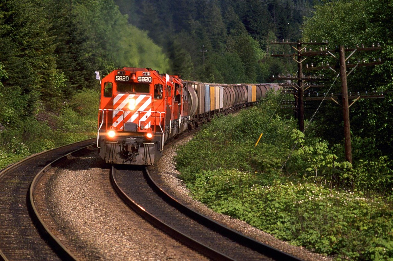 This sun makes a brief appearance on this day, just as this westbound potash train runs along the Yale siding.