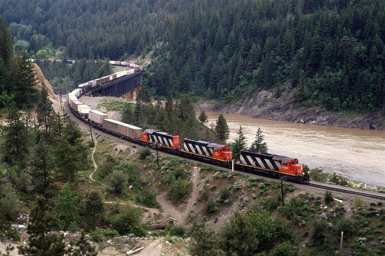 The other bridge in Lytton that crosses the Fraser River after the Thompson River confluence. This is an eastbound manifest train with a little intermodal on the front end.