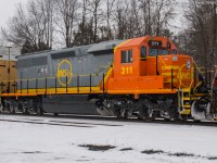 QNSL 311 hitches a ride on CN 148 through Copetown this afternoon.  It is returning from the US after getting rebuilt.