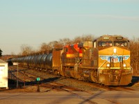 UP 5550 and KCS 4166 lead a short 80 car 647 through Ayr, ON in the last rays of sunlight