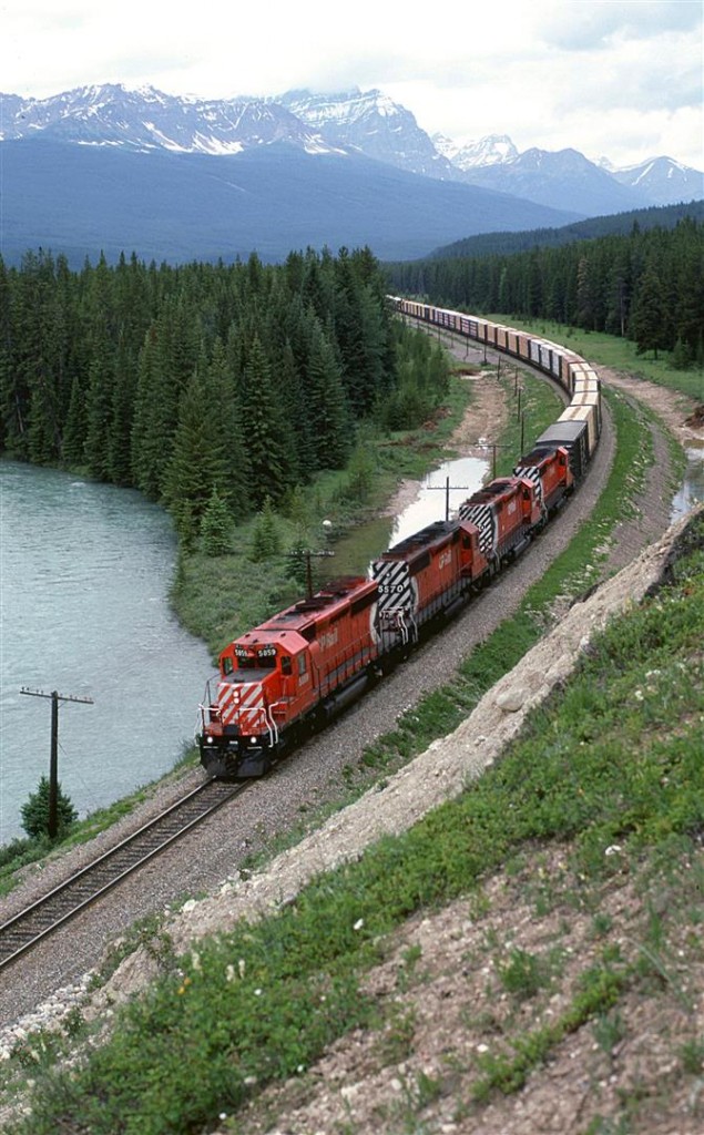 No, not Morant's Curve. This is a spot adjacent to Byway 1A, about 2 km north of Castle Junction. This eastbound wood product train rounds a nice curve with mountains and the Bow River, very similar to the more famous curve several miles to the west.
This is the first photo taken with my new camera.