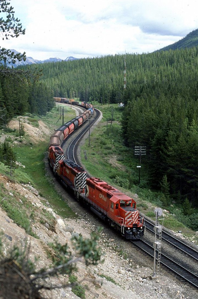 A westbound manifest approaches the west switch of Stephen and will immediately begin the descent into Field.