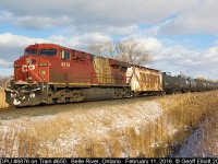 CP Train #650 rolls through Belle River, Ontario on February 11th with CP DPU 8876, a former Vancouver Olympics unit, shoving hard on the rear.  Decided to grab this as it went by while I was waiting on CP #647 to depart west with a KCS unit trailing.