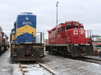 Waiting to get picked up and delivered to the Ontario Southland at any moment, GP9u waits on track 1 west of the Diesel Shop after having a bottom deck inspection to ensure it is safe to travel.