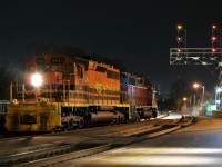 NECR 3840 - RLHH 3403 pause under the signal bridge at Brantford to drop off a couple of crew members