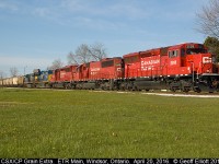 Big move on the Essex Terminal today as another CSX unit grain train is delivered to the ETR for forwarding to ADM out in Ojibway.  Train arrived early this morning with CSX 3292 and 772 as power.  Train was tied down @ Dougal Ave. until T28's power, CP 5028, 6229, and 5024 were added to the head end.  From there T28 pulled the 80 car empty train east onto the ETR and down past Howard Ave to clear the crossovers at Lakeshore.  ETR GP9 #108 would have the honors of taking the train to ADM and it waited for 5024 to shove back to where it was waiting.  Once ETR 108 was coupled on and had air on the train, T28/CSX power was cut away and ETR 108 headed for Ojibway while the CP/CSX consist headed back to Windsor Yard.