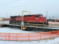 This locomotive was brought onto the turntable to spin around so it could head eastbound. After setting up the unit on the turntable track the table wouldn't operate. Another locomotive was quickly assigned to the eastbound while facility maintenance was dispatched to repair the table which was fixed by the end of the day.