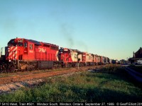 When the '501 Blues' came along you always paid attention.  Here CP train #501, with CP 5410 leading a 'full house' of SOO's over Cotton Belt's, rolls by Windsor South station in the late afternoon light of September 27, 1989.  The Cotton Belt units are brand new GP60's from the GMDD plant in London, Ontario making their way to Chicago for delivery to the SP.