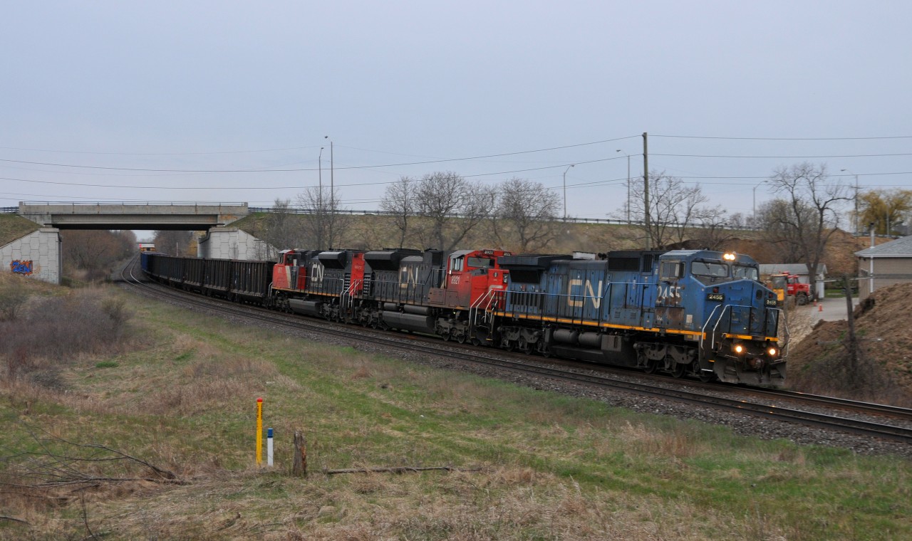 IC 2455, CN 8921, and CN 8872 lead A43431 30 through Garden Ave with 167 cars