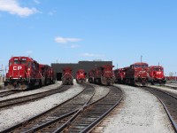 Here are the locomotives that spent Victoria Day parked at the west end of the Diesel Shop tracks. This view is looking eastward towards the shop. Visible from left to right is track 1 with GP38-2 remote 4508 and two stored AC4400's , track 2 has AC4400 8501, track 2.5 (this is a half track as it doesn't provide entry to the shop)has GP38-2 3061, track 3 a pair of AC4400's with 8500 at the west end, track 4 stored AC4400 8541 and SD40-2 5879 and track 5 another GP38-2 Remote 4426.