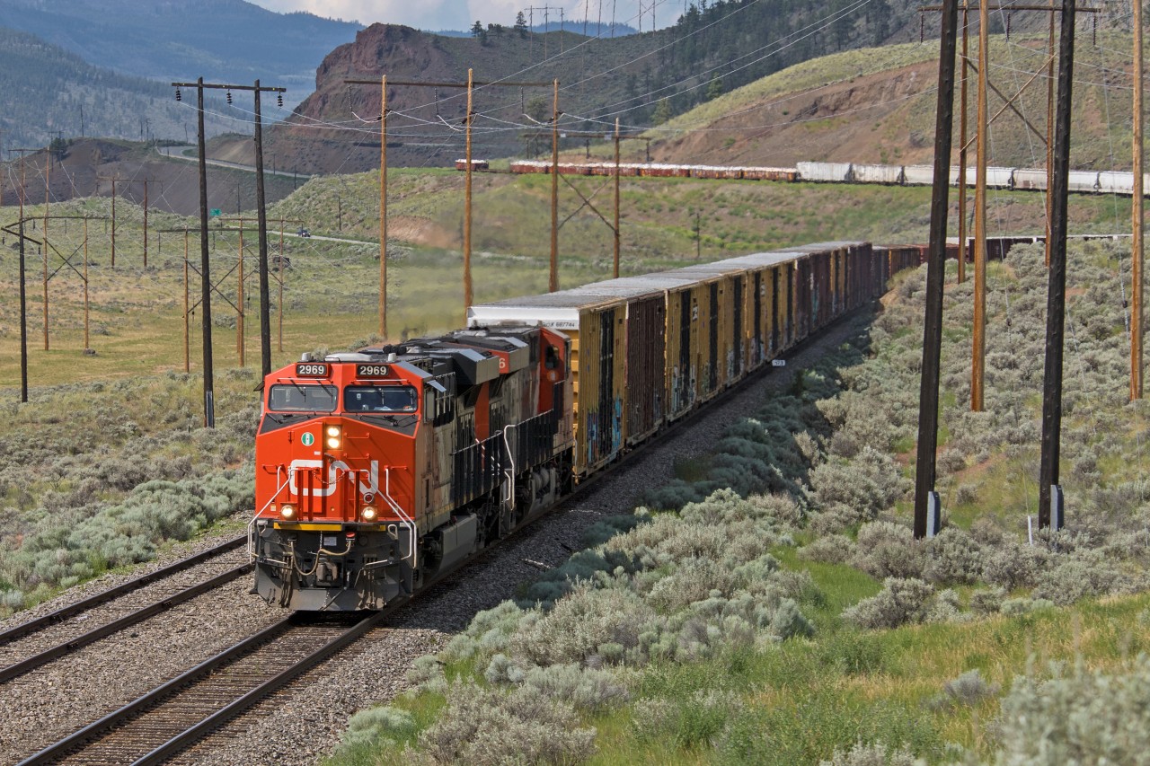 Canadian National ES44AC 2969 leads a rare afternoon southbound through Glenfraser, BC, on the former BC Rail's Lillooet Sub.