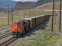 Canadian National ES44AC 2969 leads a rare afternoon southbound through Glenfraser, BC, on the former BC Rail's Lillooet Sub.