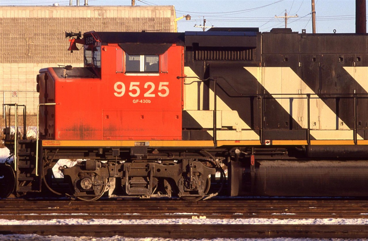 Another of CN's unique locomotives. The GP40-2L(W)'s wide cab was a harbinger of things to come to North American RR's, albeit rather slowly. This was not a good thing. Personally, I think it is rather ugly on a narrow body locomotive - it looked like a bloody broken nose. 
Many, but not all, GP and SD-40's suffered with this look. Luckily CN wasn't quick to purchase new locomotives. The next generation of power arrived with another relatively rare characteristic - cowls. Although there were F-45's in the 'States, CN was the only company to order cowled SD 50's, 60' and their first dip into the GE pool