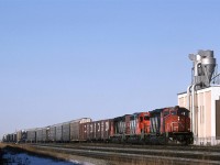 An eastbound auto train is approaching Calder shops and yard at 1033hrs. Part of the large Alberta Terminals' grain handling facility as seen at right. Dunvegan Junction is just to the left of AT's property, and is where the Westlock Sub to NW Alberta and Northern BC splits from the mainline Edson Sub.
We must have been having some good weather, and I was able to take a break from my studies on this mid February day.   