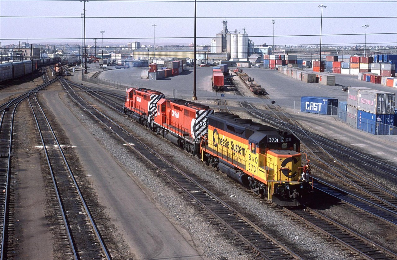 A quick stop in Calgary yielded a few shots from the Alyth Shop area. A leased Chessie System GP-40 addes some bright colour to the area. Note the small inter-modal yard. It looks to be an impound lot for towed cars now.