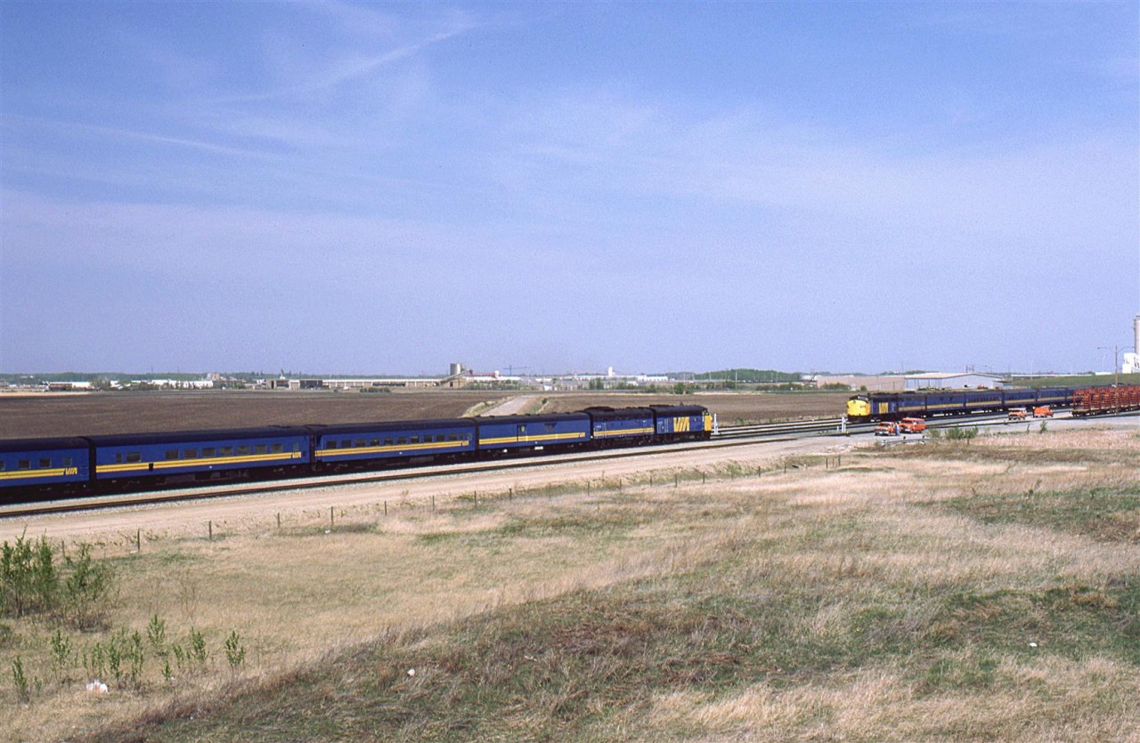 A meeting of the eastbound "Super Continental" and the combined "Super Continental" and "Skeena" at west Edmonton's Bissell Yard.