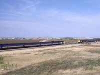 A meeting of the eastbound "Super Continental" and the combined "Super Continental" and "Skeena" at west Edmonton's Bissell Yard.