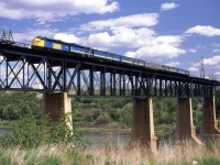 Another shot on the high bridge over the North Saskatchewan River as the train enters Edmonton from the east.
Because it is summer-ish, the "Super Continental" warrants a stainless steel dome car. That is probably good for the passengers but it screws up the aesthetics.
