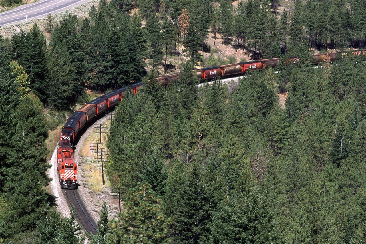 Most railfans at this spot are training their lenses on the CN as it traverses the north side of the Thompson River through White Canyon. I only had this eastbound CP empty grain train to photograph.