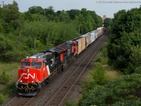 CN 3069 and CN 3063 power CN 435 out of Brantford on a warm July afternoon.  I was amazed at how quiet the pair of new Tier 4 GE's were as they pulled by me with a fair sized train in tow.  Three days later Michael Berry would catch 3069 in Montreal, neat to see how power rotates across the CN system.