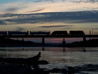 As the last light of the day quickly disappeared, RLHH 3049 and RLHH 3404 lead a long 597 across the Grand River in Caledonia